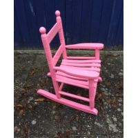 Roze schommelstoeltje voor kinderen